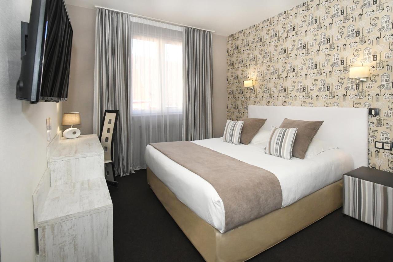 Logis Hotel Du Centre - Halte Ideale En Cyclotourisme Avec Garage A Velos Clos 莫尔塞姆 外观 照片